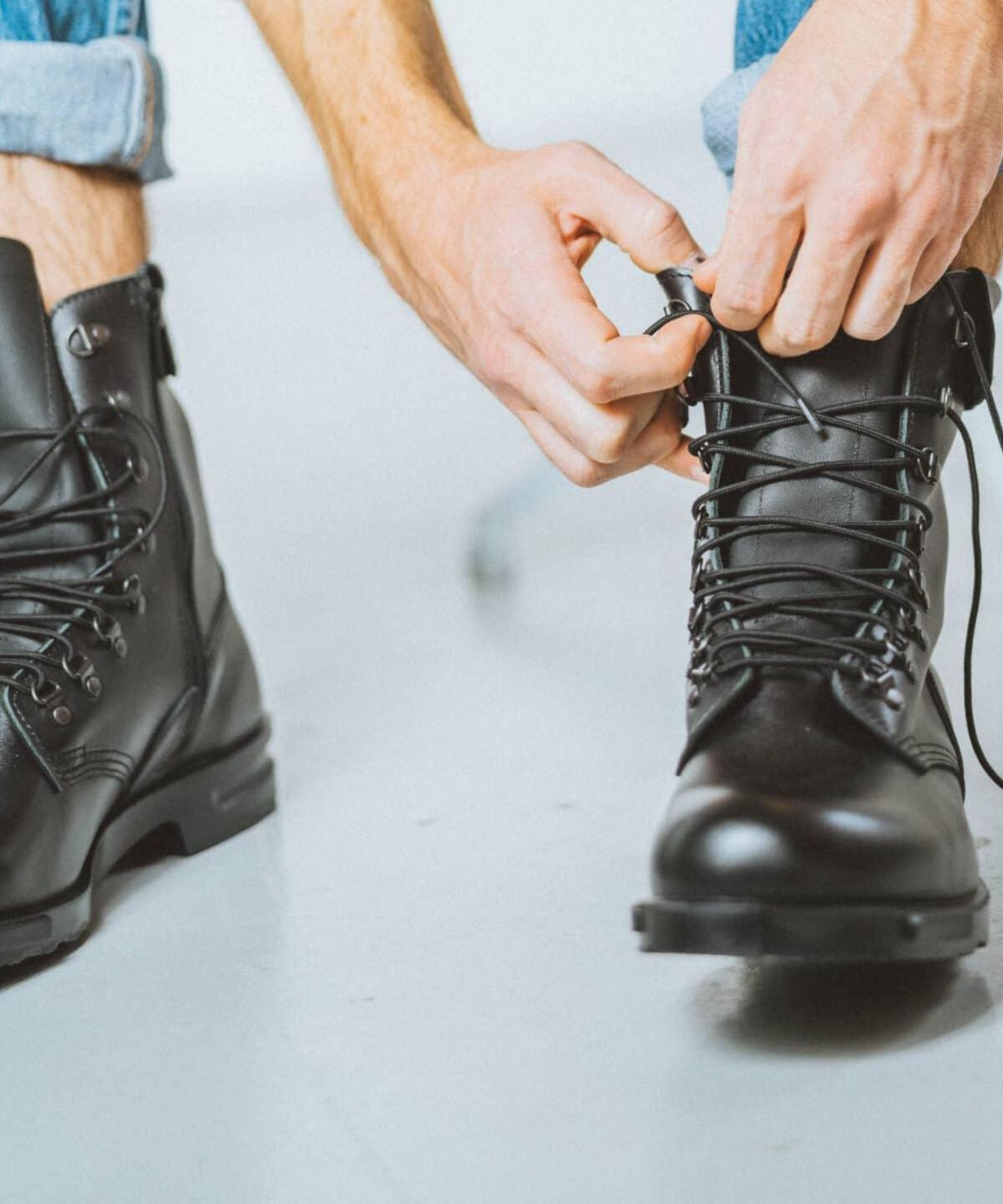 Close up picture of Samelin boots on foot being laced up